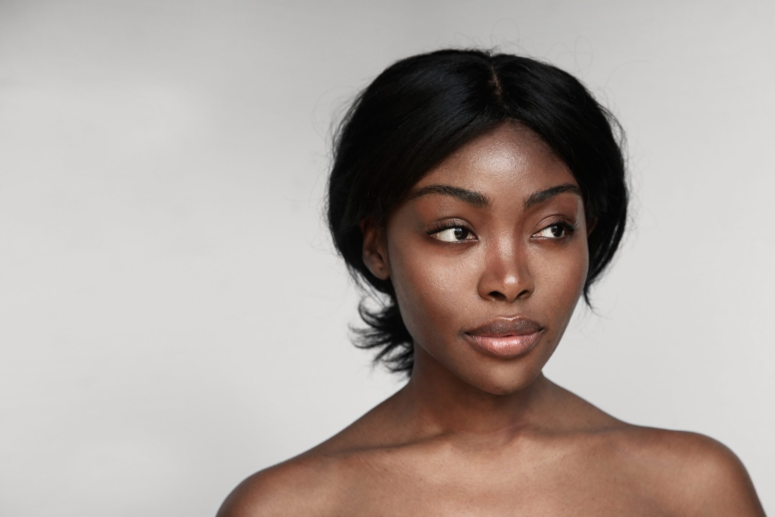 Woman with radiant, melanin-rich skin